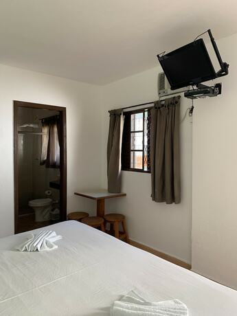 Imagen de la habitación del Hotel Pousada Vale da Montanha, Serra Negra. Foto 20