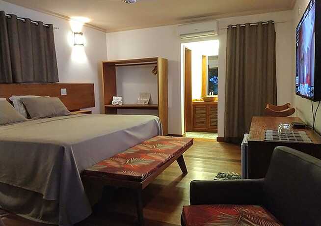 Imagen de la habitación del Hotel Pousada Vila Araticum Praia. Foto 11