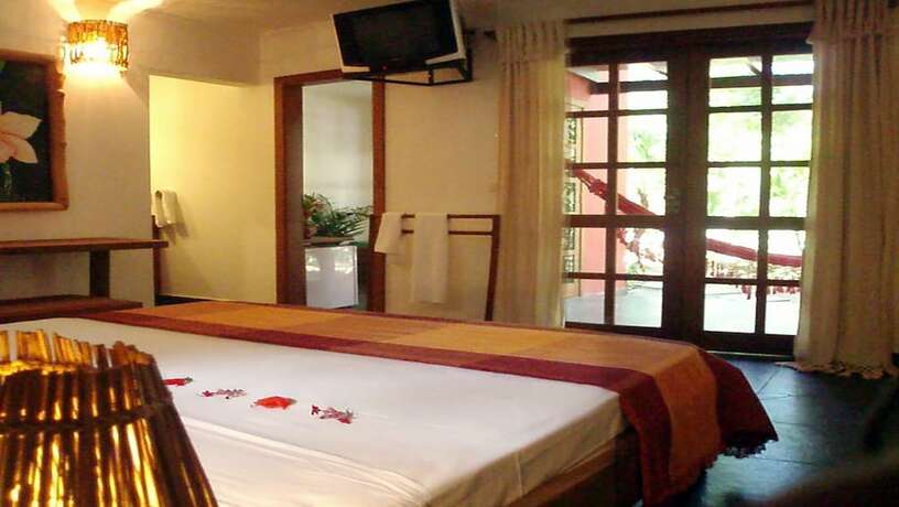 Imagen de la habitación del Hotel Pousada Vila Araticum Praia. Foto 13