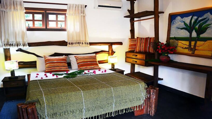 Imagen de la habitación del Hotel Pousada Vila Araticum Praia. Foto 15