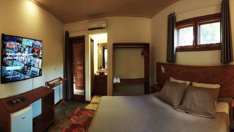 Imagen de la habitación del Hotel Pousada Vila Araticum Praia. Foto 17