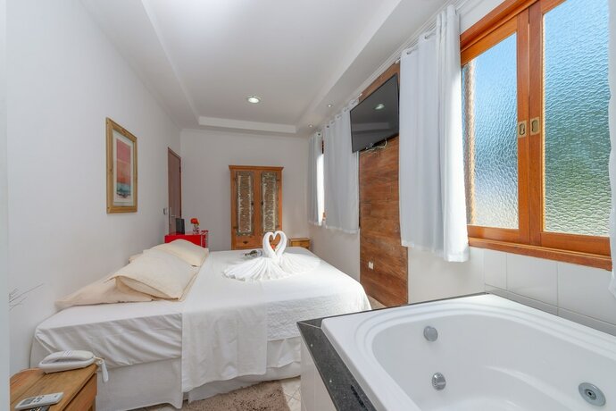 Imagen de la habitación del Hotel Pousada Vila Bareque&ccedil;aba. Foto 28