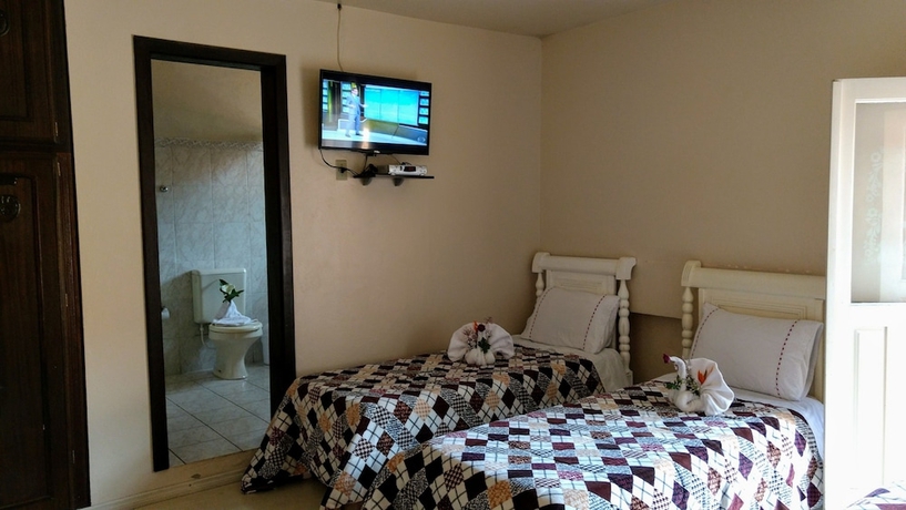 Imagen de la habitación del Hotel Pousada Vila Cezar Canela. Foto 7