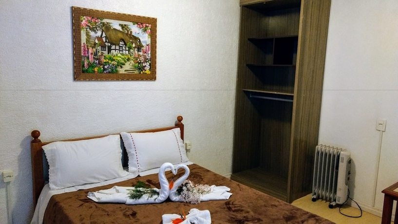 Imagen de la habitación del Hotel Pousada Vila Cezar Canela. Foto 8