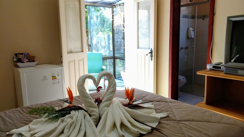 Imagen de la habitación del Hotel Pousada Vila Cezar Canela. Foto 17