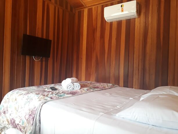 Imagen de la habitación del Hotel Pousada Vila Novo Tempo, Guaruja. Foto 18