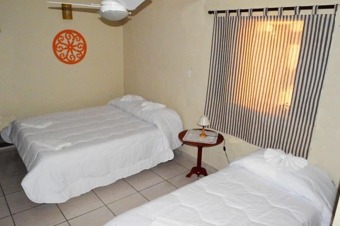 Imagen de la habitación del Hotel Pousada Villa Tr&ecirc;s, Serra Negra. Foto 17
