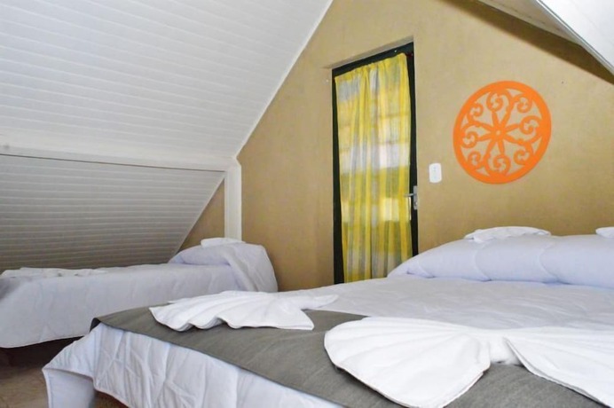 Imagen de la habitación del Hotel Pousada Villa Tr&ecirc;s, Serra Negra. Foto 18