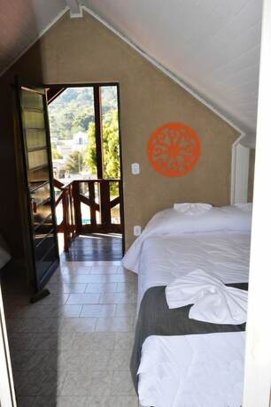 Imagen de la habitación del Hotel Pousada Villa Tr&ecirc;s, Serra Negra. Foto 20