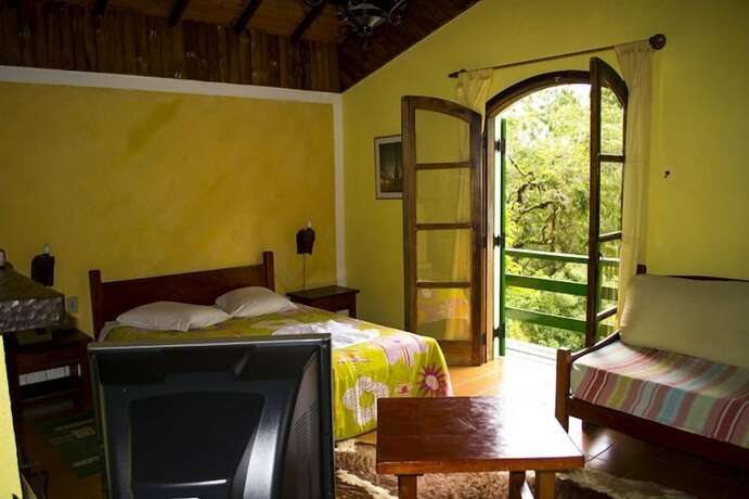 Imagen de la habitación del Hotel Pousada Villa do Sol, Camanducaia. Foto 15