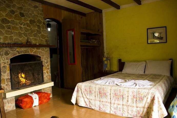 Imagen de la habitación del Hotel Pousada Villa do Sol, Camanducaia. Foto 19