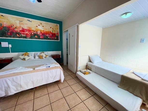 Imagen de la habitación del Hotel Pousada Vison Ubatuba - Praia Grande. Foto 6