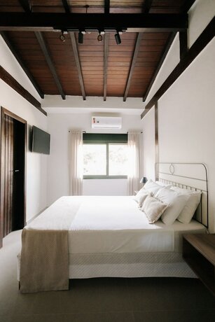 Imagen de la habitación del Hotel Pousada Zama. Foto 17