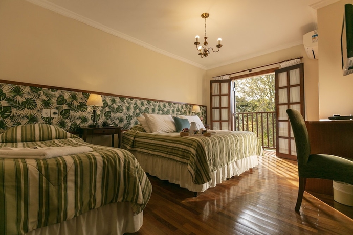 Imagen de la habitación del Hotel Pousada das Hort&ecirc;nsias, Campos do Jordao. Foto 2