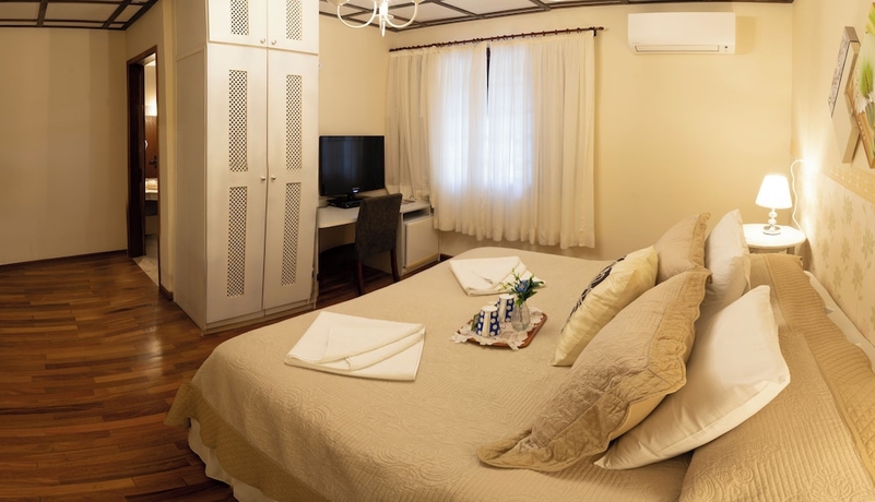 Imagen de la habitación del Hotel Pousada das Hort&ecirc;nsias, Campos do Jordao. Foto 6