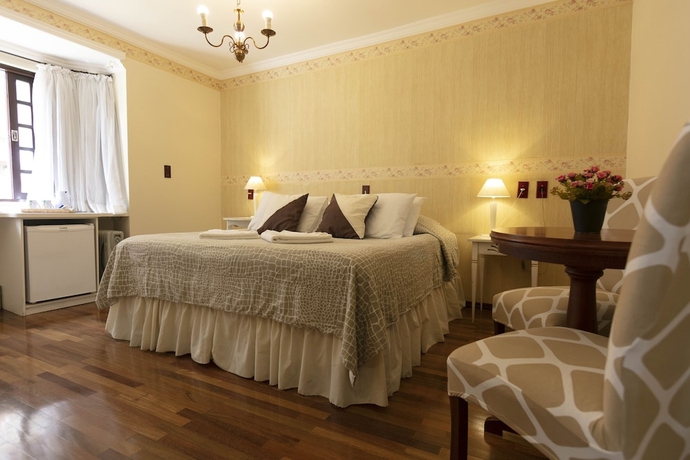 Imagen de la habitación del Hotel Pousada das Hort&ecirc;nsias, Campos do Jordao. Foto 8