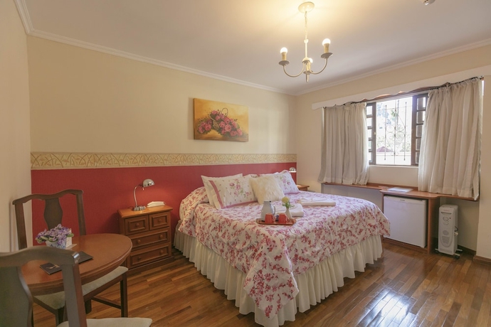 Imagen de la habitación del Hotel Pousada das Hort&ecirc;nsias, Campos do Jordao. Foto 11