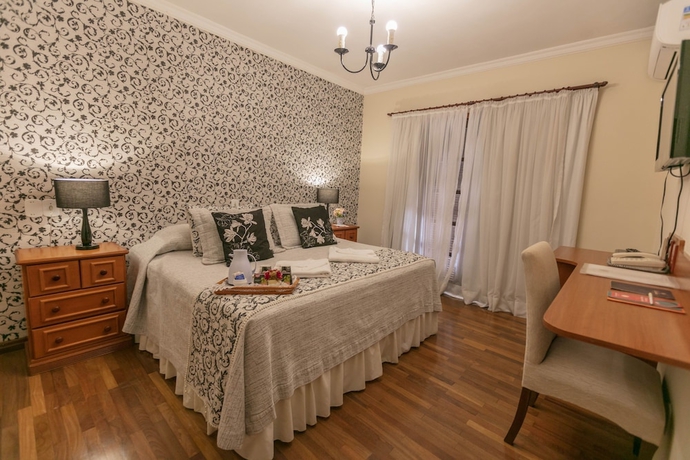 Imagen de la habitación del Hotel Pousada das Hort&ecirc;nsias, Campos do Jordao. Foto 14