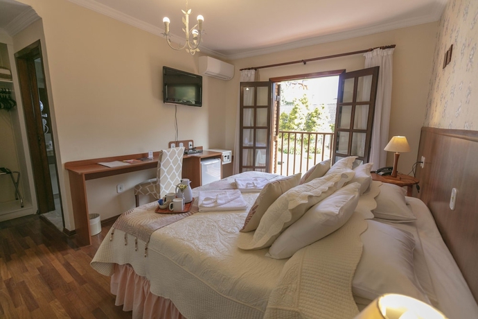 Imagen de la habitación del Hotel Pousada das Hort&ecirc;nsias, Campos do Jordao. Foto 18