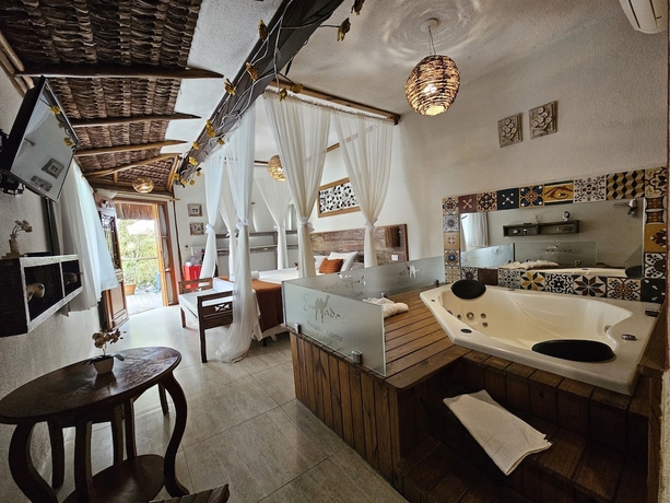 Imagen de la habitación del Hotel Pousada de Charme Emirados. Foto 5
