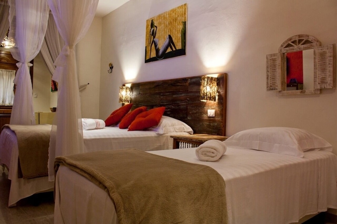 Imagen de la habitación del Hotel Pousada de Charme Emirados. Foto 13