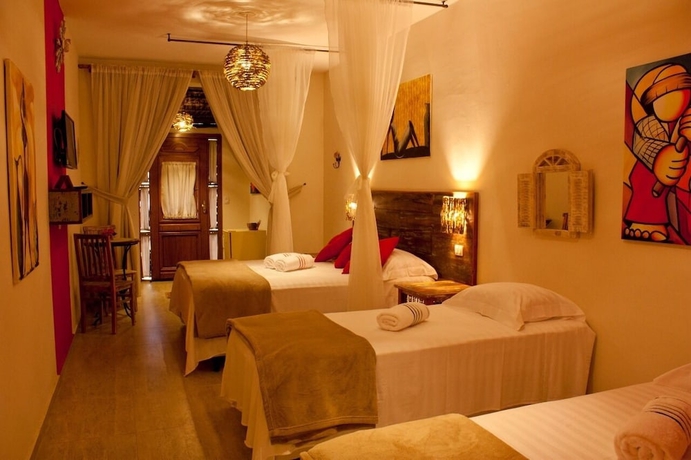 Imagen de la habitación del Hotel Pousada de Charme Emirados. Foto 14