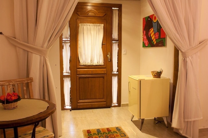 Imagen de la habitación del Hotel Pousada de Charme Emirados. Foto 15