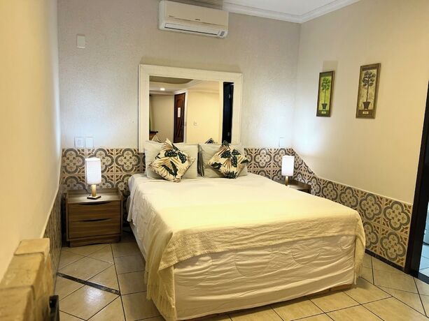 Imagen de la habitación del Hotel Pousada do Sol de Penedo. Foto 12