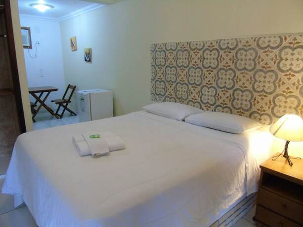 Imagen de la habitación del Hotel Pousada do Sol de Penedo. Foto 13