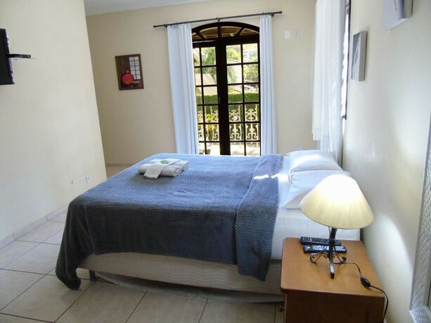 Imagen de la habitación del Hotel Pousada do Sol de Penedo. Foto 17