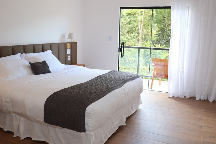 Imagen de la habitación del Hotel Pousada menino de ouro. Foto 5