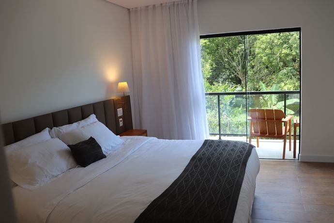 Imagen de la habitación del Hotel Pousada menino de ouro. Foto 6