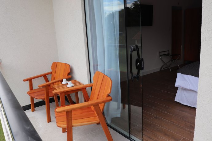 Imagen de la habitación del Hotel Pousada menino de ouro. Foto 12