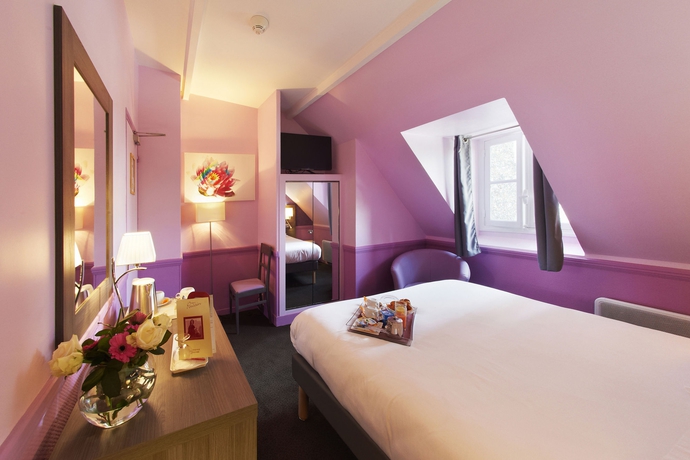 Imagen de la habitación del Hotel Poussin. Foto 7