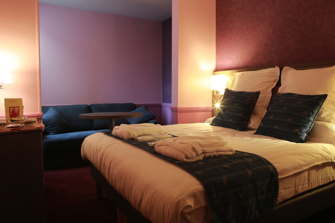 Imagen de la habitación del Hotel Poussin. Foto 9