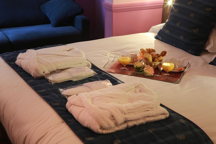 Imagen de la habitación del Hotel Poussin. Foto 15