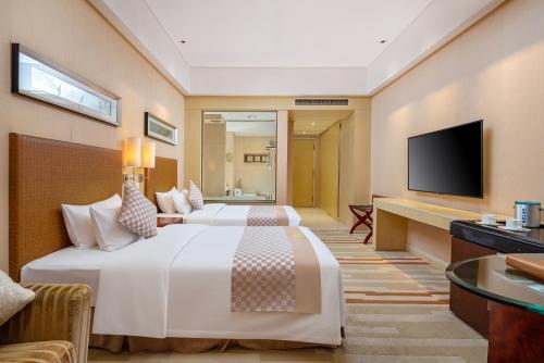 Imagen de la habitación del Hotel Power Valley International. Foto 19