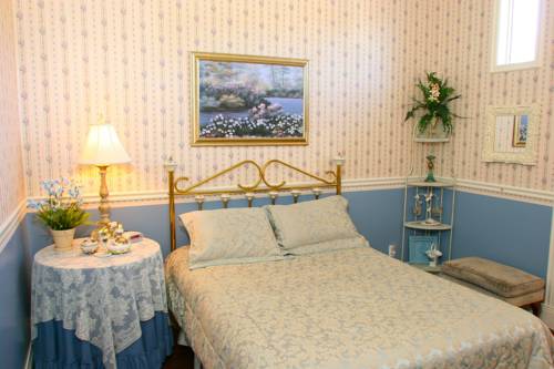 Imagen de la habitación del Hotel Power's Mansion Inn. Foto 4