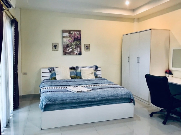 Imagen de la habitación del Hotel Pp Garden Villa. Foto 7