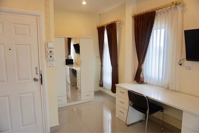 Imagen de la habitación del Hotel Pp Garden Villa. Foto 15