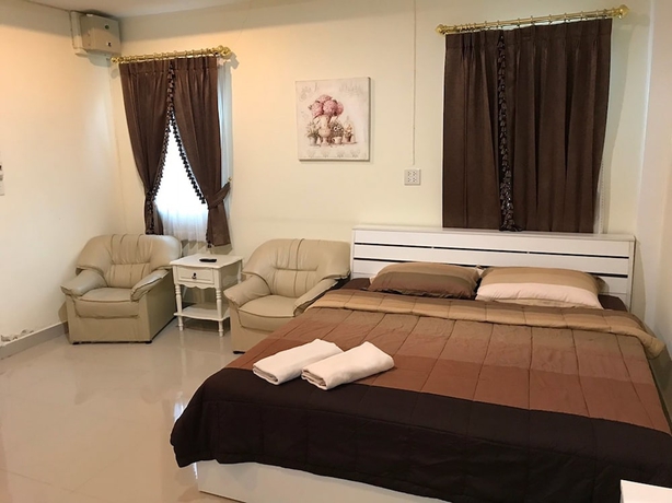 Imagen de la habitación del Hotel Pp Garden Villa. Foto 16