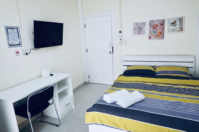 Imagen de la habitación del Hotel Pp Garden Villa. Foto 19