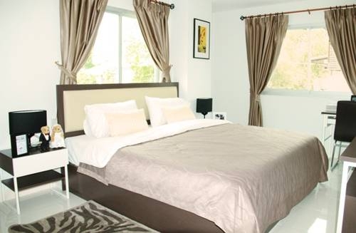 Imagen de la habitación del Hotel Pp Plus Mansion. Foto 15