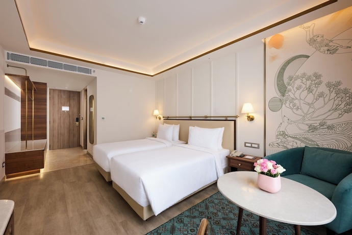 Imagen de la habitación del Hotel Prachi Sarovar Premiere Bhubaneshwar. Foto 3