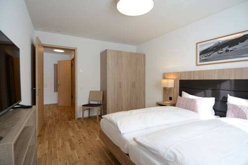 Imagen de la habitación del Hotel Pradas Resort Brigels. Foto 8