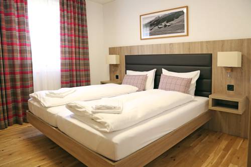 Imagen de la habitación del Hotel Pradas Resort Brigels. Foto 16
