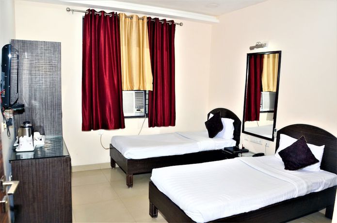 Imagen de la habitación del Hotel Pradeep Palace. Foto 5