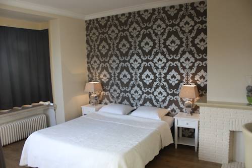 Imagen de la habitación del Hotel Prado Next Door. Foto 11