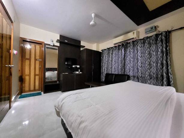 Imagen de la habitación del Hotel Pradyut. Foto 9