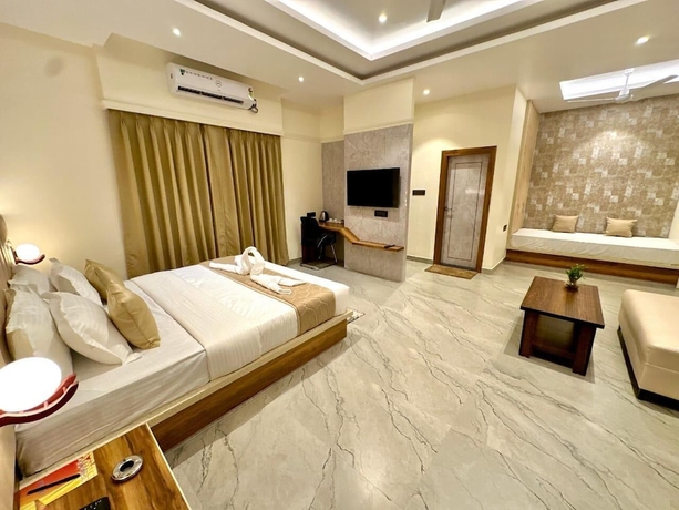 Imagen de la habitación del Hotel Prag Mahal Residency. Foto 11